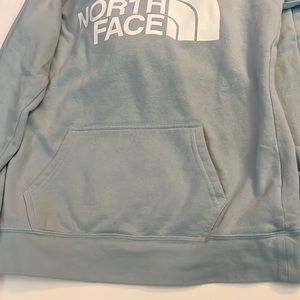Baby blue north face hoodie.
